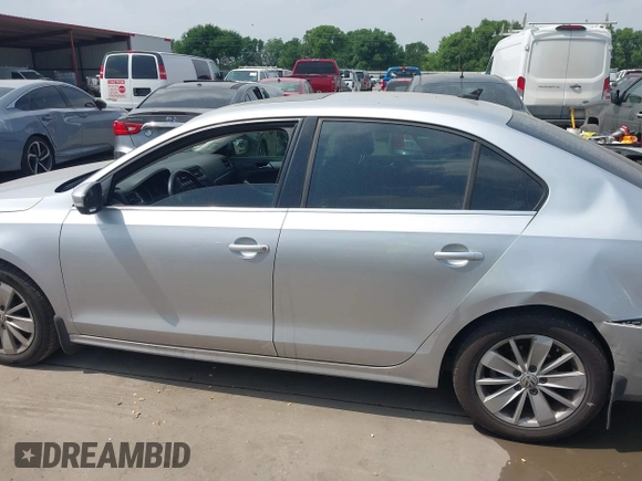 2016 Volkswagen Jetta Sedan 1.4T SE with VIN 3VWD67AJXGM319278, listed as a IAAI auction lot 41954099 with 92,614 mi miles. Bid and sale history available at carsss.com. Image 14.
