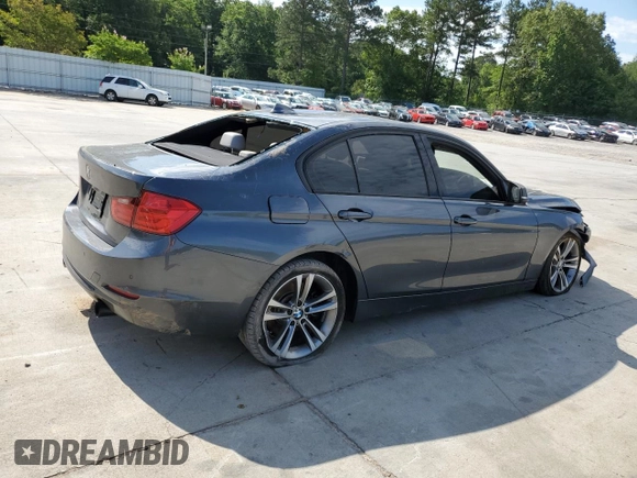 2012 BMW 3 Series 335i with VIN WBA3A9C5XCF474803, listed as a Copart auction lot 57940675 with 121,960 mi miles and Salvage title. Bid and sale history available at DreamBid. Image 3.