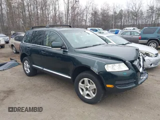 2004 Volkswagen Touareg z VIN WVGBC67L44D016442, wystawiony jako IAAI lot #41794695 z przebiegiem 215 554 mil mil oraz . Historia ofert i sprzedaży dostępna na DreamBid. Obrazek 1.