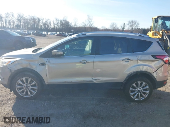 2017 Ford Escape Titanium with VIN 1FMCU0JD2HUD92675, listed as a IAAI auction lot 41834723 with 113,503 mi miles. Bid and sale history available at carsss.com. Image 14.