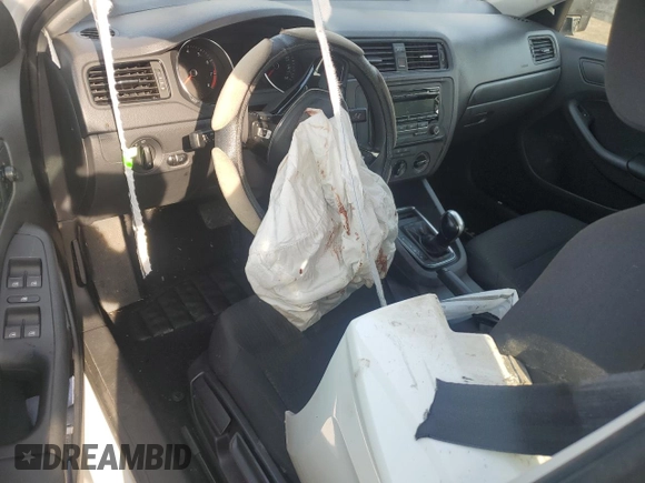 2015 Volkswagen Jetta S z VIN 3VW2K7AJ2FM309510, wystawiony jako Copart lot #60823955 z przebiegiem Nie podano mil oraz Szkoda całkowita • Salvage title. Historia ofert i sprzedaży dostępna na DreamBid. Obrazek 8.