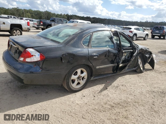 2000 Ford Taurus SE with VIN 1FAFP53U9YG285971, listed as a Copart auction lot 78138984 with 182,135 mi miles and Salvage Title. Bid and sale history available at DreamBid. Image 3.