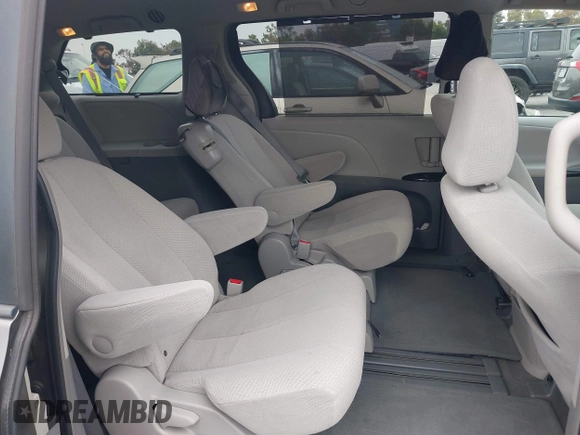 2012 Toyota Sienna LE AAS with VIN 5TDKK3DC0CS236786, listed as a IAAI auction lot 42401816 with 219,738 mi miles and . Bid and sale history available at DreamBid. Image 8.