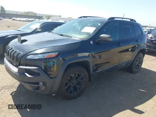 2016 Jeep Cherokee Trailhawk with VIN 1C4PJMBB9GW179051, listed as a IAAI auction lot 42520342 with 100,538 mi miles and . Bid and sale history available at DreamBid. Image 2.