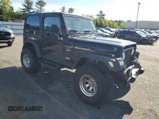 2001 Jeep Wrangler Sport with VIN 1J4FA49S21P339042, listed as a Copart auction lot 56922555 with 113,315 mi miles and Salvage title. Bid and sale history available at DreamBid. Image 4.