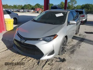 2019 Toyota Corolla L with VIN 5YFBURHE2KP902370, listed as a IAAI auction lot 41858056 with 92,092 mi miles. Bid and sale history available at carsss.com. Image 2.