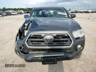 2019 Toyota Tacoma SR z VIN 3TMCZ5AN1KM191177, wystawiony jako Copart lot #56282085 z przebiegiem 110 837 mil mil oraz Szkoda całkowita • Salvage title. Historia ofert i sprzedaży dostępna na DreamBid. Obrazek 13.