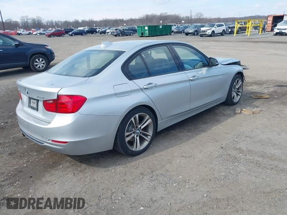 2014 BMW 3 Series 328i xDrive with VIN WBA3B3C58EJ980379, listed as a IAAI auction lot 41678676 with 183,278 mi miles. Bid and sale history available at carsss.com. Image 4.