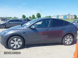 2023 Tesla Model Y Long Range with VIN 7SAYGDEE4PA037218, listed as a IAAI auction lot 42232704 with 18,756 mi miles and . Bid and sale history available at DreamBid. Image 15.
