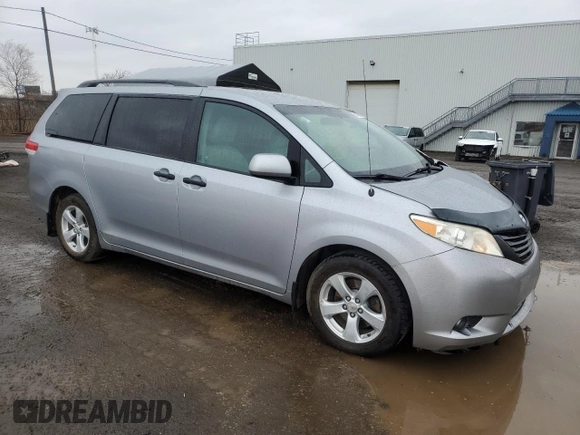 2012 Toyota Sienna with VIN 5TDZK3DC1CS213175, listed as a Copart auction lot 55475615 with 216,082 mi miles and Salvage title. Bid and sale history available at DreamBid. Image 4.