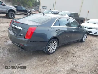 2014 Cadillac CTS Sedan RWD with VIN 1G6AP5SX8E0191104, listed as a IAAI auction lot 41605919 with 137,837 mi miles. Bid and sale history available at carsss.com. Image 4.