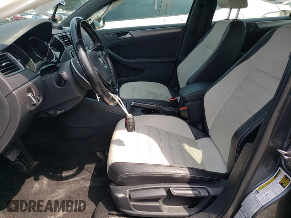 2016 Volkswagen Jetta Sport with VIN 3VWD17AJ1GM366357, listed as a Copart auction lot 61309615 with 99,108 mi miles and Salvage title. Bid and sale history available at DreamBid. Image 7.