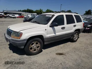 2001 Jeep Grand Cherokee Laredo z VIN 1J4GW48N21C505942, wystawiony jako Copart lot #60498825 z przebiegiem 258 115 mil mil oraz Czysty tytuł • Clean title. Historia ofert i sprzedaży dostępna na DreamBid. Obrazek 1.