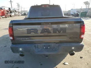 2018 Ram 1500 Rebel z VIN 1C6RR7YT1JS161619, wystawiony jako Copart lot #58272215 z przebiegiem 49 567 mil mil oraz Szkoda całkowita • Salvage title. Historia ofert i sprzedaży dostępna na DreamBid. Obrazek 6.