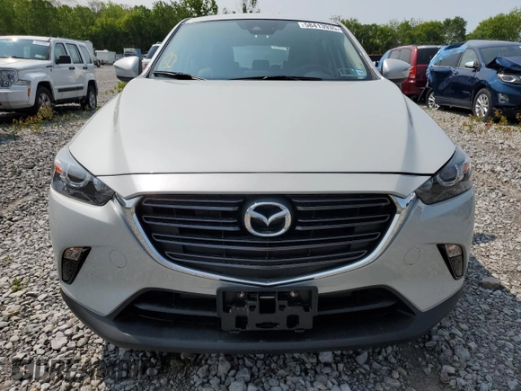 2019 Mazda CX-3 Touring z VIN JM1DKFC76K1451342, wystawiony jako Copart lot #58413935 z przebiegiem 21 391 mil mil oraz Szkoda całkowita • Salvage title. Historia ofert i sprzedaży dostępna na DreamBid. Obrazek 5.