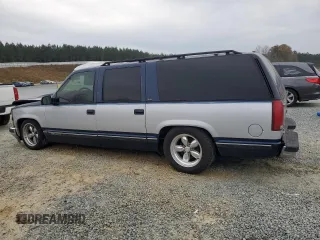 1994 GMC Suburban z VIN 1GKEC16K4RJ762562, wystawiony jako Copart lot #81242184 z przebiegiem 182 583 mil mil oraz Szkoda całkowita • Salvage title. Historia ofert i sprzedaży dostępna na DreamBid. Obrazek 2.