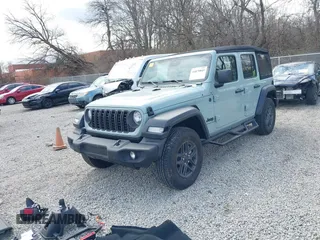 2024 Jeep Wrangler Willys with VIN 1C4PJXDG6RW331770, listed as a IAAI auction lot 41879849 with 6,100 mi miles and . Bid and sale history available at carsss.com. Image 2.