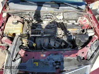 2006 Ford Focus S z VIN 1FAHP34N36W250236, wystawiony jako Copart lot #53794555 z przebiegiem 198 791 mil mil oraz Szkody całkowita. Historia ofert i sprzedaży dostępna na DreamBid. Obrazek 11.