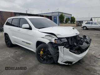 2018 Jeep Grand Cherokee Trackhawk with VIN 1C4RJFN91JC293695, listed as a Copart auction lot 59031525 with 8,565 mi miles and Salvage title. Bid and sale history available at DreamBid. Image 4.