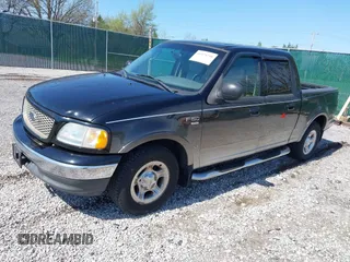 2003 Ford F-150 XLT with VIN 1FTRW07653KC18900, listed as a IAAI auction lot 41979710 with 99,525 mi miles. Bid and sale history available at carsss.com. Image 2.