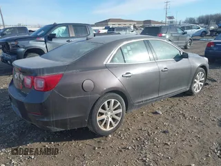 2013 Chevrolet Malibu LTZ with VIN 1G11H5SA9DF150247, listed as a IAAI auction lot 41376113 with 190,498 mi miles and . Bid and sale history available at DreamBid. Image 4.