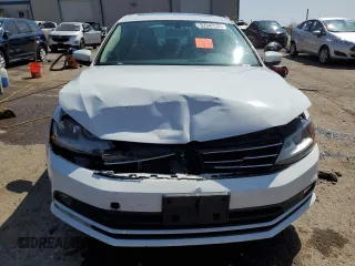 2017 Volkswagen Jetta SEL z VIN 3VWL17AJXHM282017, wystawiony jako Copart lot #52349335 z przebiegiem 107 933 mil mil oraz Szkoda całkowita • Salvage title. Historia ofert i sprzedaży dostępna na DreamBid. Obrazek 5.