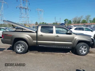 2015 Toyota Tacoma with VIN 3TMMU4FN5FM082376, listed as a IAAI auction lot 42144113 with 98,244 mi miles and . Bid and sale history available at DreamBid. Image 14.