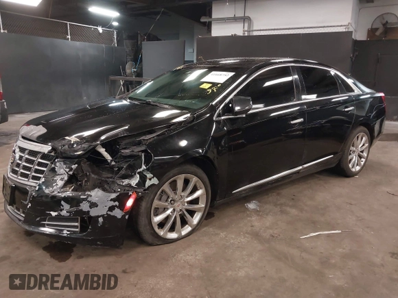 2013 Cadillac XTS Luxury z VIN 2G61R5S34D9102625, wystawiony jako IAAI lot #41668752 z przebiegiem 112 065 mil mil oraz . Historia ofert i sprzedaży dostępna na DreamBid. Obrazek 18.