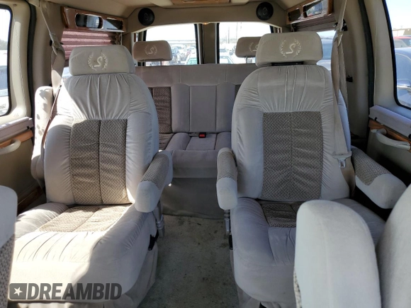 2007 Chevrolet Express Passenger z VIN 1GBFG15T471230597, wystawiony jako Copart lot #46646695 z przebiegiem 154 251 mil mil oraz Szkoda całkowita • Salvage title. Historia ofert i sprzedaży dostępna na DreamBid. Obrazek 10.