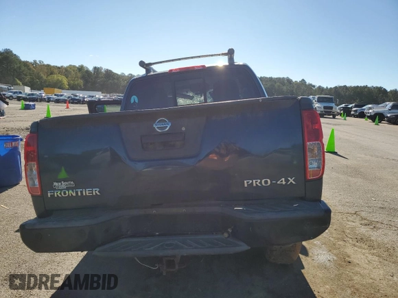 2016 Nissan Frontier Pro-4X z VIN 1N6AD0EV6GN799371, wystawiony jako Copart lot #81292914 z przebiegiem Nie podano mil oraz Szkoda całkowita • Salvage title. Historia ofert i sprzedaży dostępna na DreamBid. Obrazek 6.