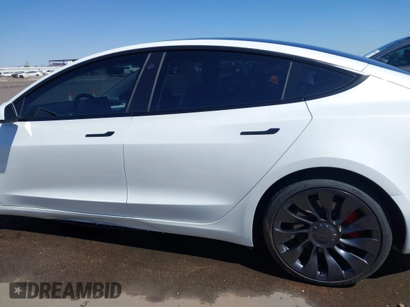 2023 Tesla Model 3 Performance z VIN 5YJ3E1EC7PF432748, wystawiony jako IAAI lot #41841913 z przebiegiem 36 043 mil mil oraz . Historia ofert i sprzedaży dostępna na DreamBid. Obrazek 14.