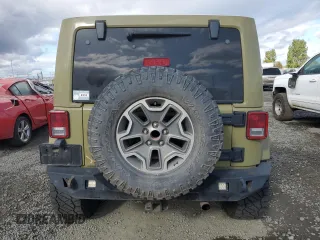 2013 Jeep Wrangler Unlimited Rubicon 10th Anniversary with VIN 1C4HJWFG4DL549065, listed as a Copart auction lot 75899594 with 127,960 mi miles and Salvage title. Bid and sale history available at DreamBid. Image 6.