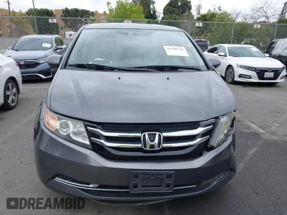 2014 Honda Odyssey EX-L with VIN 5FNRL5H64EB055807, listed as a IAAI auction lot 41760758 with 144,346 mi miles and . Bid and sale history available at carsss.com. Image 12.