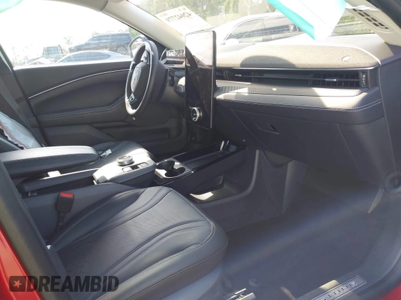 2023 Ford Mustang Mach-E Premium with VIN 3FMTK3SU7PMA97466, listed as a IAAI auction lot 42042779 with 11,016 mi miles and . Bid and sale history available at DreamBid. Image 5.