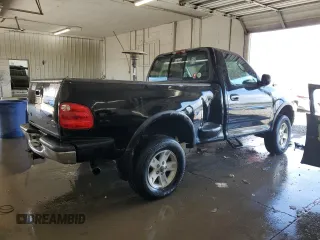 2003 Ford F-150 with VIN 2FTRF08L03CA03160, listed as a Copart auction lot 51591535 with 220,630 mi miles and Salvage title. Bid and sale history available at DreamBid. Image 3.