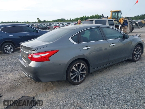 2016 Nissan Altima SR with VIN 1N4AL3AP2GC220196, listed as a IAAI auction lot 42362704 with 104,939 mi miles and . Bid and sale history available at DreamBid. Image 4.