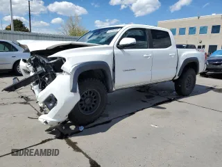 2019 Toyota Tacoma SR z VIN 3TMCZ5AN0KM275894, wystawiony jako Copart lot #54054345 z przebiegiem 81 284 mil mil oraz Szkoda całkowita • Salvage title. Historia ofert i sprzedaży dostępna na DreamBid. Obrazek 1.