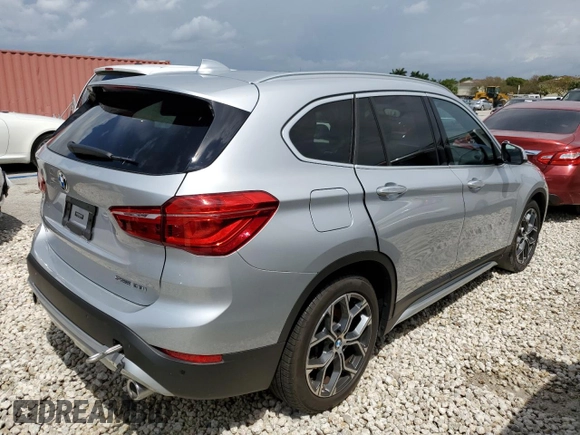 2021 BMW X1 sDrive28i with VIN WBXJG7C04M5S29295, listed as a Copart auction lot 48922203 with 14,214 mi miles. Bid and sale history available at carsss.com. Image 3.
