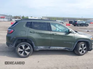 2018 Jeep Compass Latitude with VIN 3C4NJDBB4JT176031, listed as a IAAI auction lot 42125161 with 32,761 mi miles and . Bid and sale history available at DreamBid. Image 13.