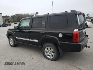 2007 Jeep Commander Overland with VIN 1J8HG68247C557731, listed as a Copart auction lot 87964795 with 174,195 mi miles and Salvage title. Bid and sale history available at DreamBid. Image 2.