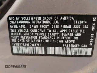 2014 Volkswagen Passat SE z VIN 1VWBN7A36EC064753, wystawiony jako IAAI lot #41221736 z przebiegiem 106 105 mil mil oraz . Historia ofert i sprzedaży dostępna na DreamBid. Obrazek 9.