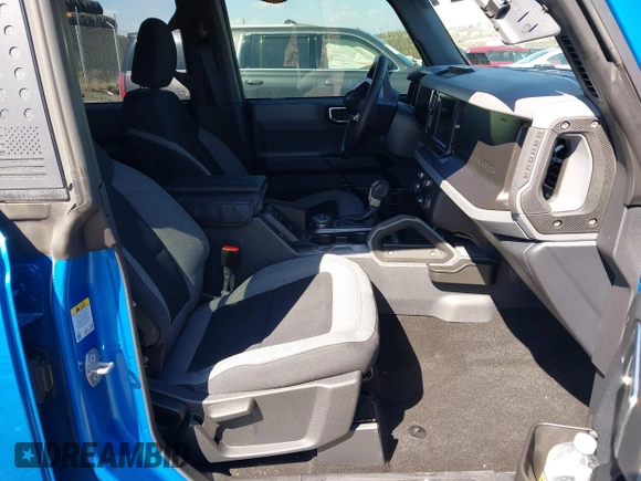 2023 Ford Bronco z VIN 1FMEE5BP1PLA88463, wystawiony jako IAAI lot #41871905 z przebiegiem 36 223 mil mil oraz . Historia ofert i sprzedaży dostępna na DreamBid. Obrazek 5.