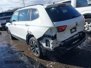 2022 Volkswagen Tiguan S with VIN 3VV0B7AX1NM035831, listed as a IAAI auction lot 41130297 with 64,298 mi miles. Bid and sale history available at carsss.com. Image 3.