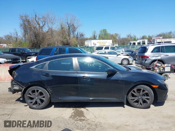 2019 Honda Civic Sport with VIN 2HGFC2F89KH569861, listed as a IAAI auction lot 41985114 with 104,880 mi miles and . Bid and sale history available at DreamBid. Image 14.