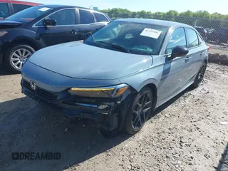 2023 Honda Civic Sport with VIN 2HGFE2F55PH517831, listed as a IAAI auction lot 42255985 with 31,554 mi miles and . Bid and sale history available at DreamBid. Image 2.