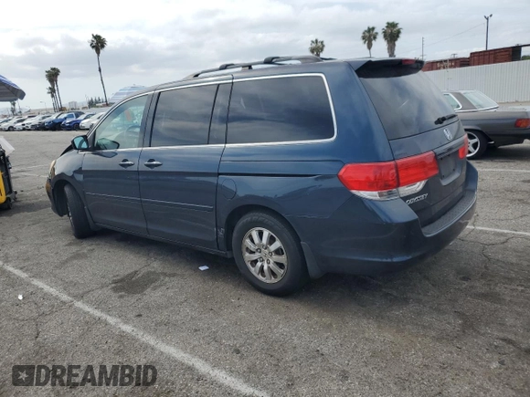 2010 Honda Odyssey EX with VIN 5FNRL3H46AB105054, listed as a Copart auction lot 56710665 with 118,156 mi miles and Salvage title. Bid and sale history available at DreamBid. Image 2.