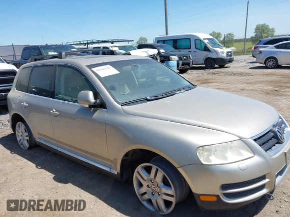 2004 Volkswagen Touareg with VIN WVGCM67L44D033856, listed as a IAAI auction lot 42142143 with 105,682 mi miles and . Bid and sale history available at DreamBid. Image 6.