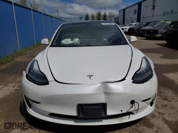 2019 Tesla Model 3 Mid Range z VIN 5YJ3E1EA0KF428001, wystawiony jako Copart lot #58480685 z przebiegiem 182 144 mil mil oraz Szkoda całkowita • Salvage title. Historia ofert i sprzedaży dostępna na DreamBid. Obrazek 5.