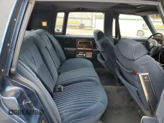 1990 Cadillac Brougham z VIN 1G6DW54Y9LR710711, wystawiony jako Copart lot #57469165 z przebiegiem Nie podano mil oraz Nie do naprawy • Non repairable. Historia ofert i sprzedaży dostępna na DreamBid. Obrazek 10.