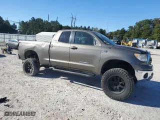 2010 Toyota Tundra 4WD Truck with VIN 5TFUY5F19AX146347, listed as a Copart auction lot 76576374 with 179,448 mi miles and Salvage Title. Bid and sale history available at carsss.com. Image 4.